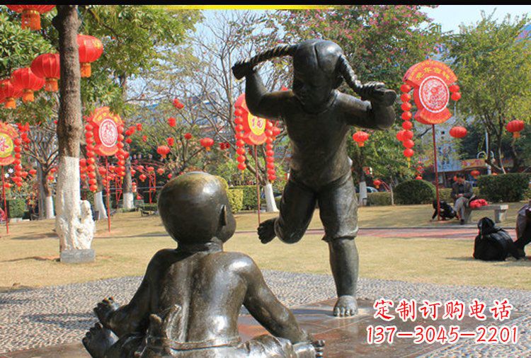 贵阳表演的儿童公园人物铜雕塑