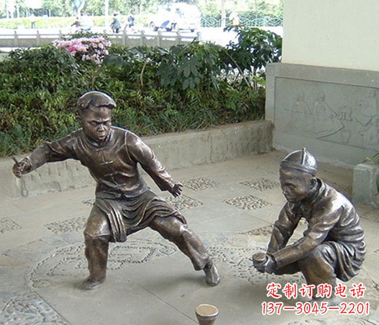 贵阳打陀螺的儿童铜雕
