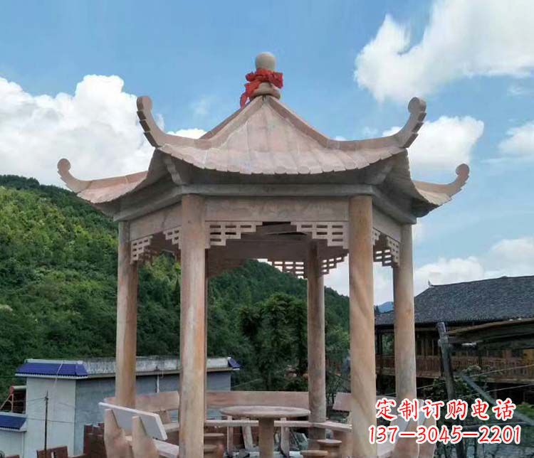 贵阳一流的公园晚霞红六角石雕凉亭