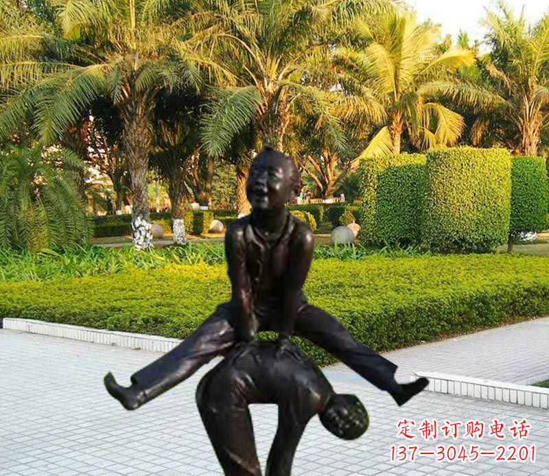 贵阳跳山羊的儿童铜雕 