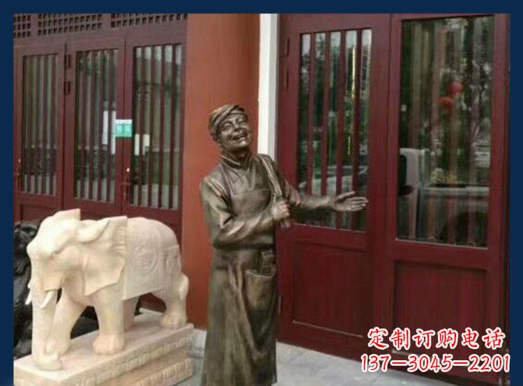 贵阳铜雕店小二酒店迎宾人物雕塑