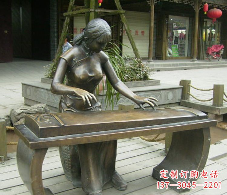 贵阳铜雕现代人物弹古筝雕塑