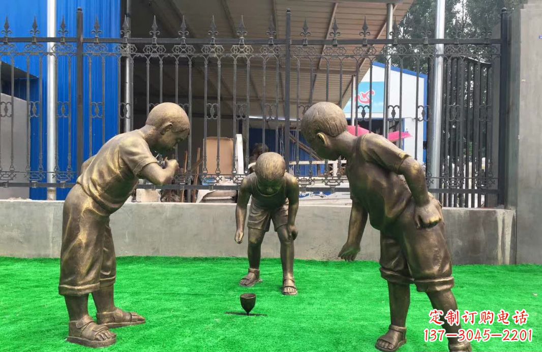 贵阳玩陀螺儿童铜雕塑