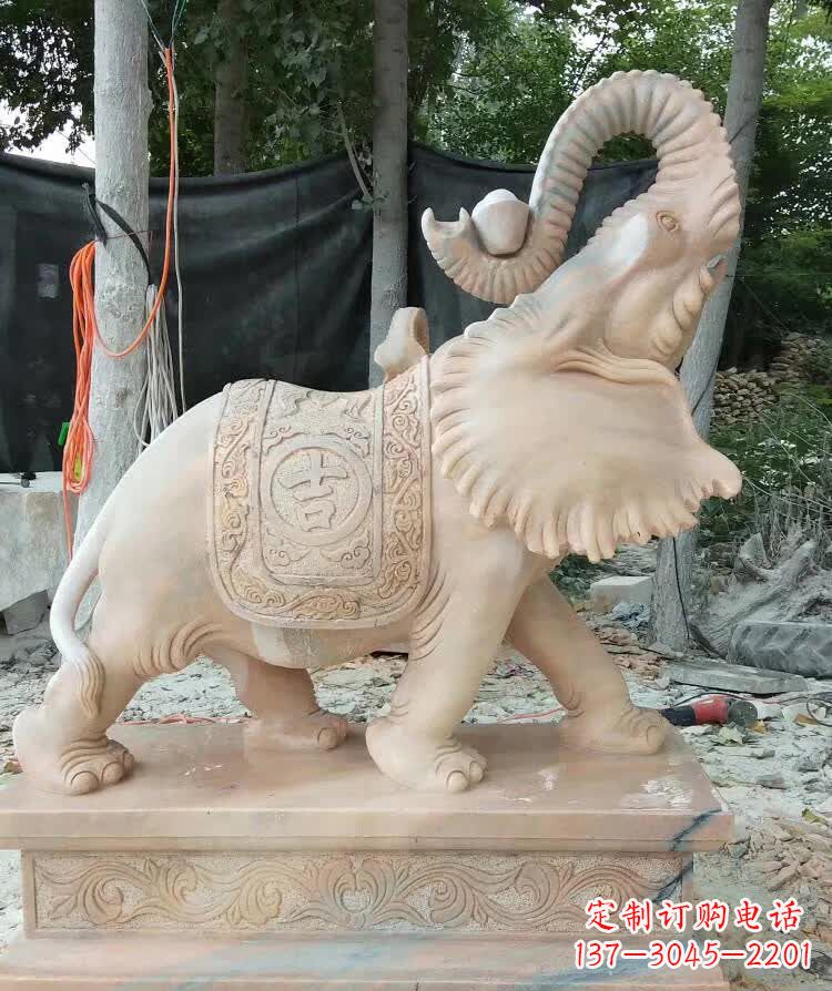 贵阳晚霞红卷元宝大象雕塑