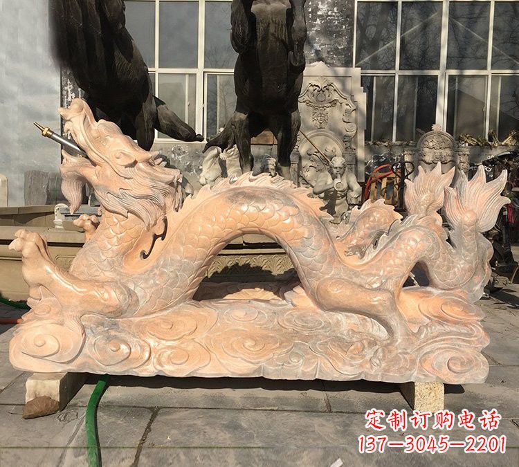贵阳晚霞红石雕喷水龙