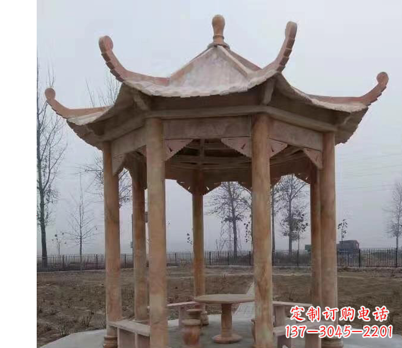 贵阳公园晚霞红八角石雕凉亭